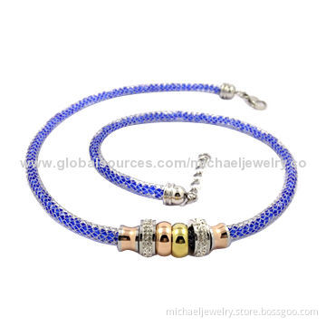 Stainless steel necklaces with interval of IP gold and rose gold plating, with blue crystals